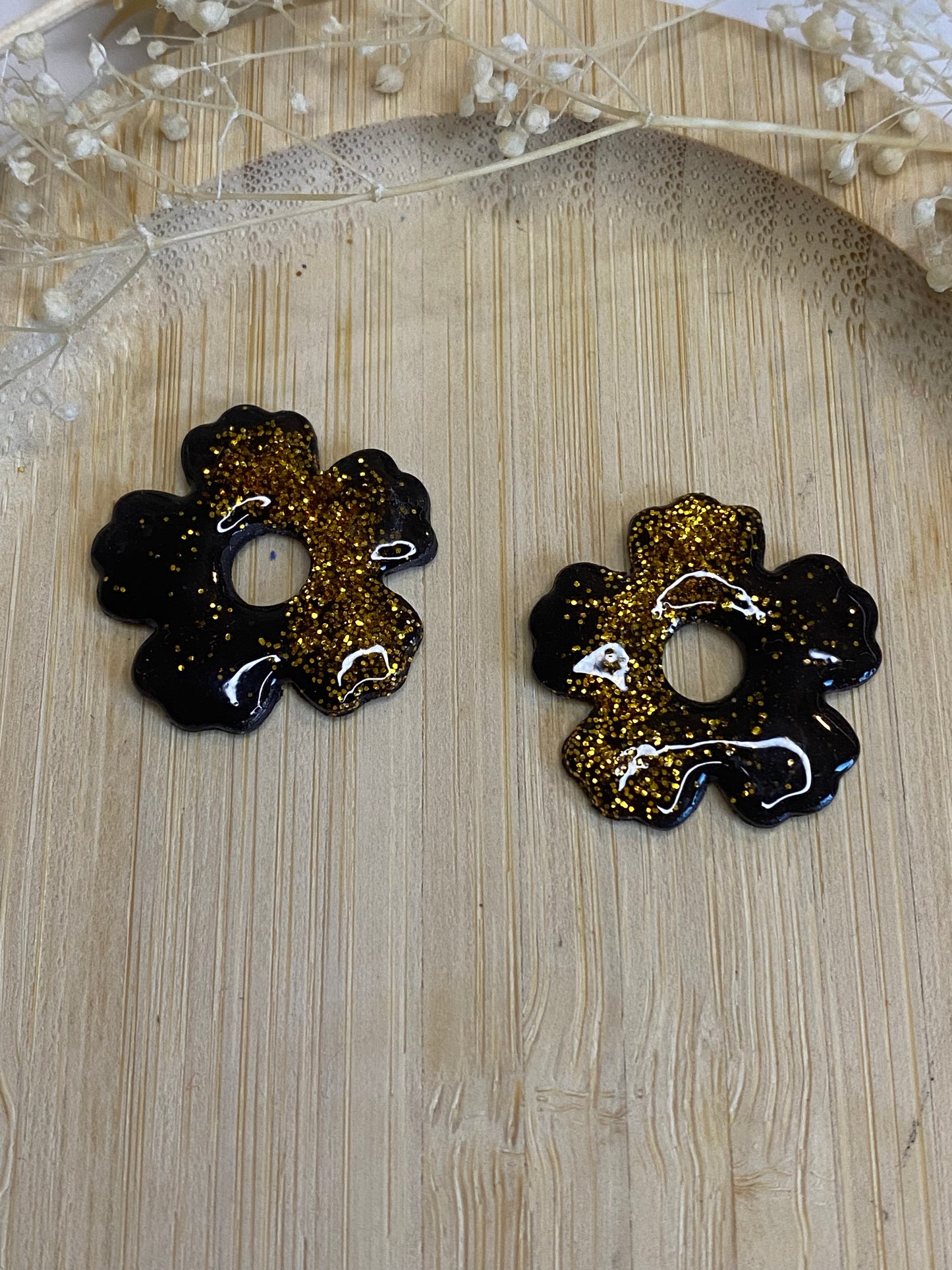 Pampilles fleurs 25mm noir paillettes or