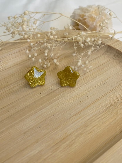 Puces d'oreilles étoiles or paillettes