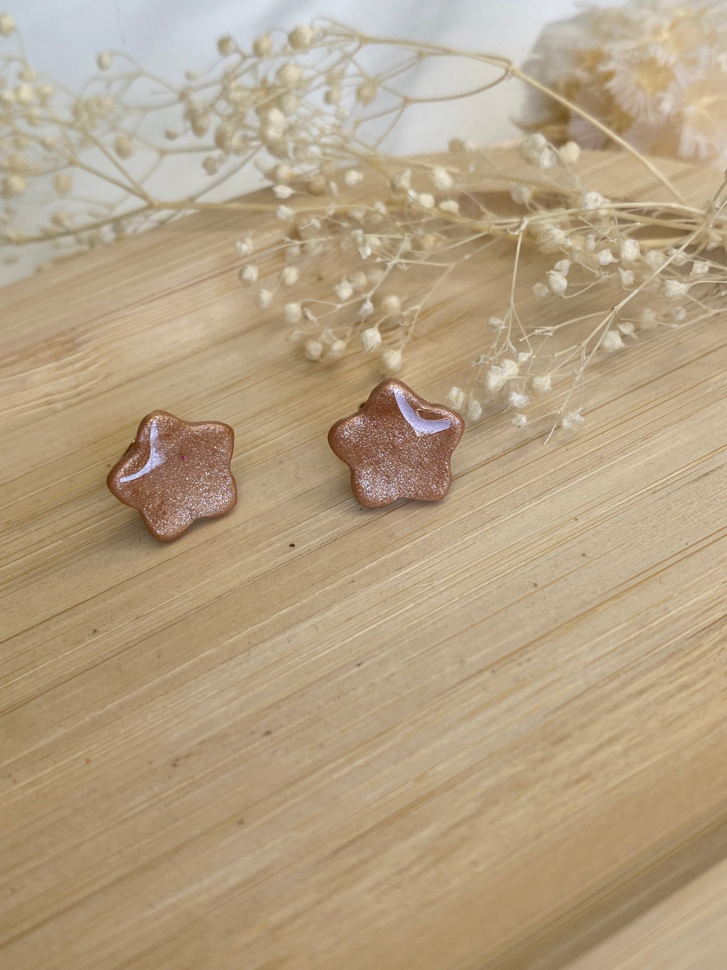 Puces d'oreilles étoiles bronze nacré