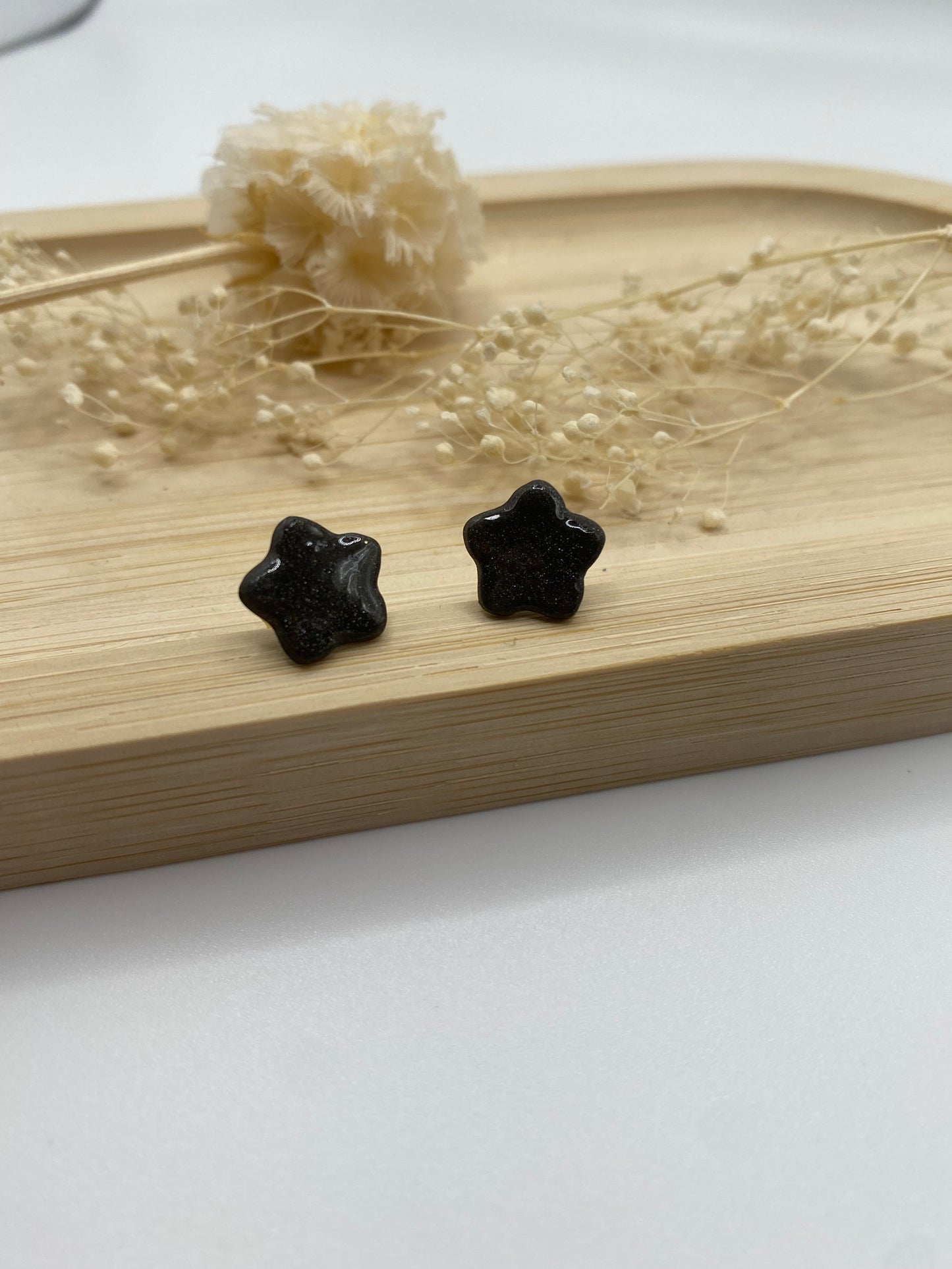 Puces d'oreilles étoiles noir nacré