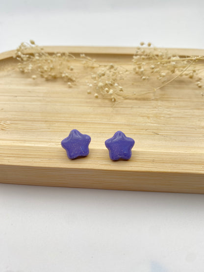 Puces d'oreilles étoiles mauve et paillettes